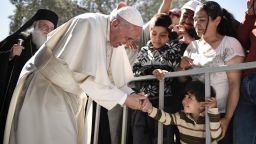 MYTILENE, GREECE - APRIL 16:  In this handout image provided by Greek Prime Minister's Office, Pope Francis meets migrants at the Moria detention centre on April 16, 2016 in Mytilene, Lesbos, Greece. Pope Francis will visit migrants at the Moria camp on the Greek island of Lesbos along with Greek Orthodox Ecumenical Patriarch Bartholomew I and Archbishop of Athens and All Greece, Ieronimos II. 