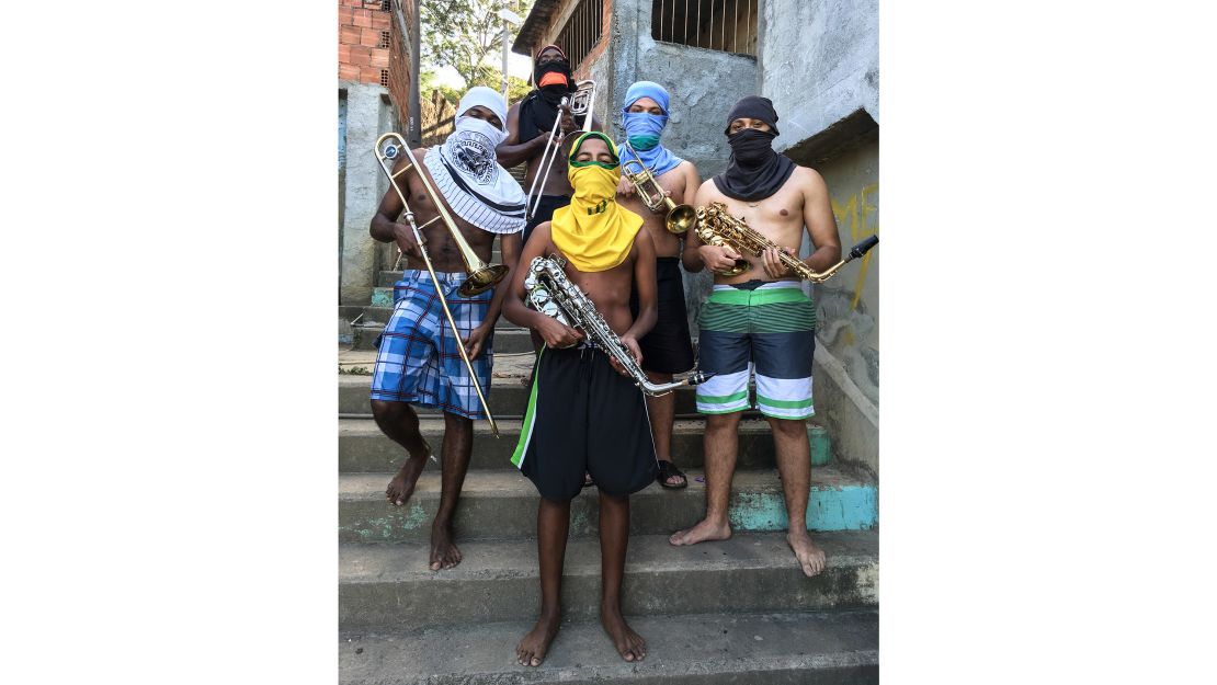 In Valentim's picture, weapons, commonly associated with Rio's youth, are replaced by instruments.