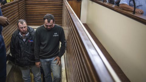 Willem Oosthuizen and Theo Martins Jackson arrive at The Middleburg Magistrate Court on November 16, 2016.