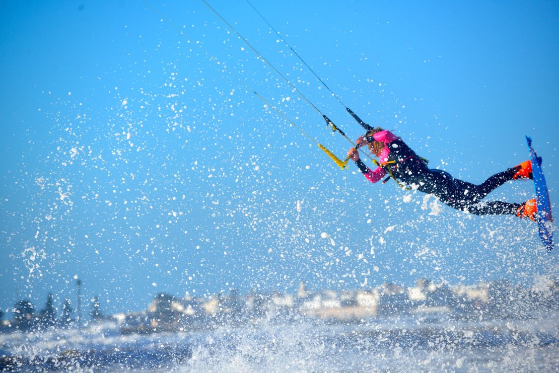 A kitesurfer catches some air off the coast of Essaouira.