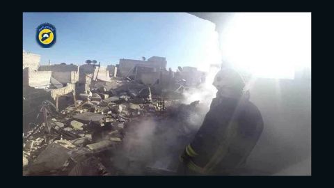 Many in Aleppo are trapped under the rubble of Thursday's strikes, a volunteer civil defense group says.