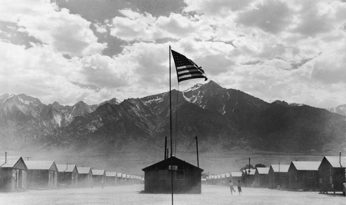 A US flag flies at a Japanese-American internment camp, circa 1942