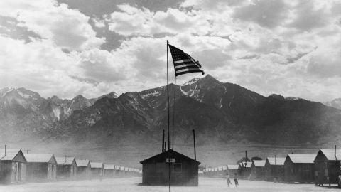 A US flag flies at a Japanese-American concentration camp in Manzanar, California, in July 1942.