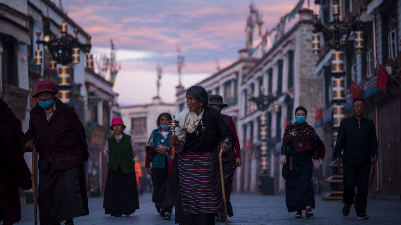 Pilgrims walking and praying near the Jokhang Temple in Lhasa, in September.