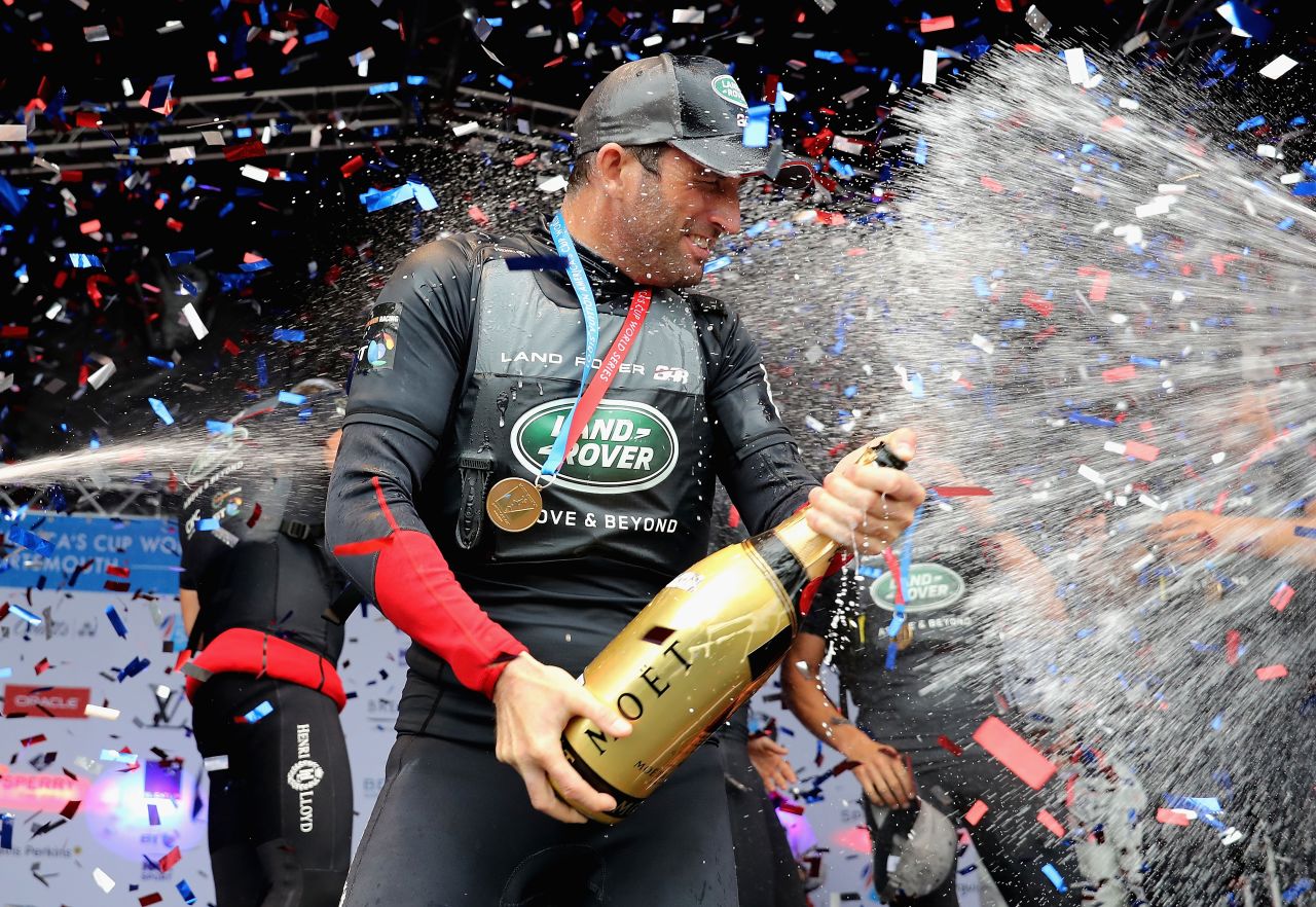 Sailing legend Ainslie celebrates victory with team Land Rover BAR at the America's Cup World Series in Portsmouth, England, in July.