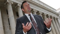 FILE - In this Aug. 23, 2016 file photo, Kansas Secretary of State Kris Kobach responds to questions outside the 10th U.S. Circuit Court of Appeals in Denver. A federal appeals court says "no constitutional doubt arises" that federal law prohibits Kansas from requiring citizenship documents from people who register to vote at motor vehicle offices. The ruling handed down late Friday evening, Sept. 30, 2016, upholds U.S. District Judge Julie Robinson's temporary order forcing Kansas to register more than 20,000 voters. The decision is the latest setback for Kobach.  (AP Photo/David Zalubowski, File)