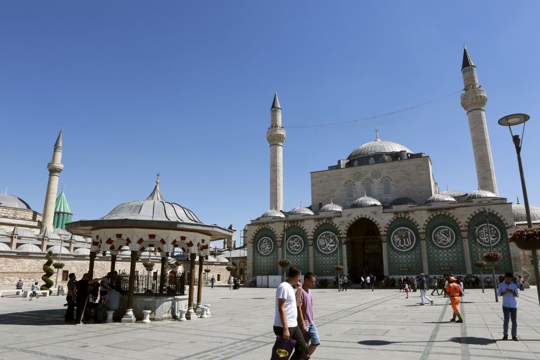 The mausoleum of Rumi and the Selamiye mosque in Konya, Turkey. 