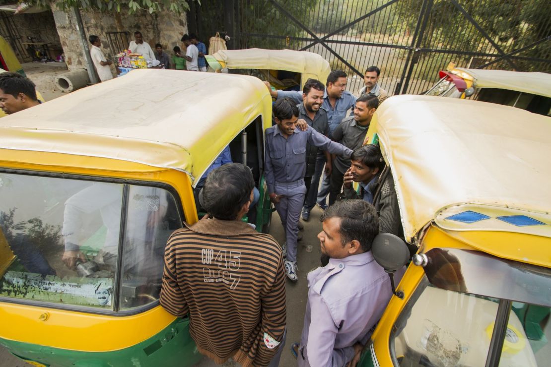 Sarvesh and the other drivers chat and laugh, despite the tough circumstances.