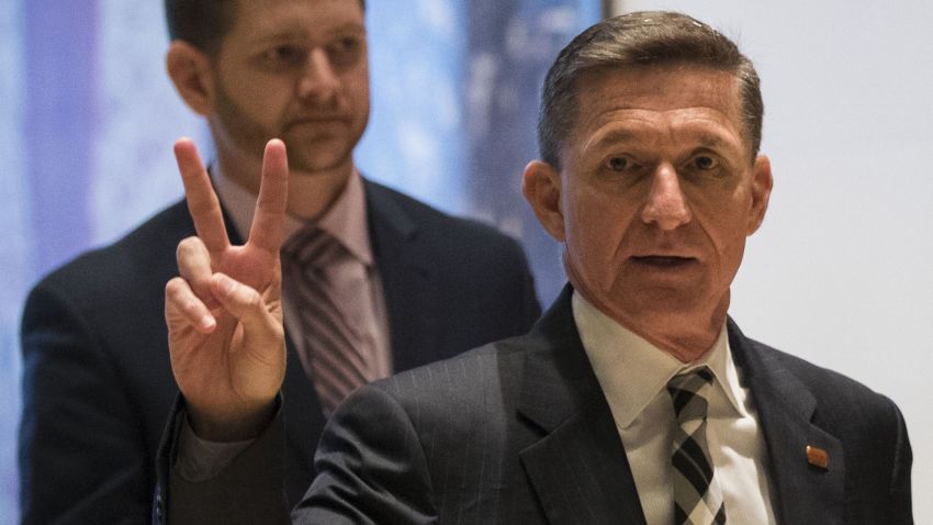 NEW YORK, NY - NOVEMBER 17: Retired Lt. Gen. Michael Flynn gestures as he arrives at Trump Tower, November 17, 2016 in New York City. President-elect Donald Trump and his transition team are in the process of filling cabinet and high level positions for the new administration. (Photo by Drew Angerer/Getty Images)