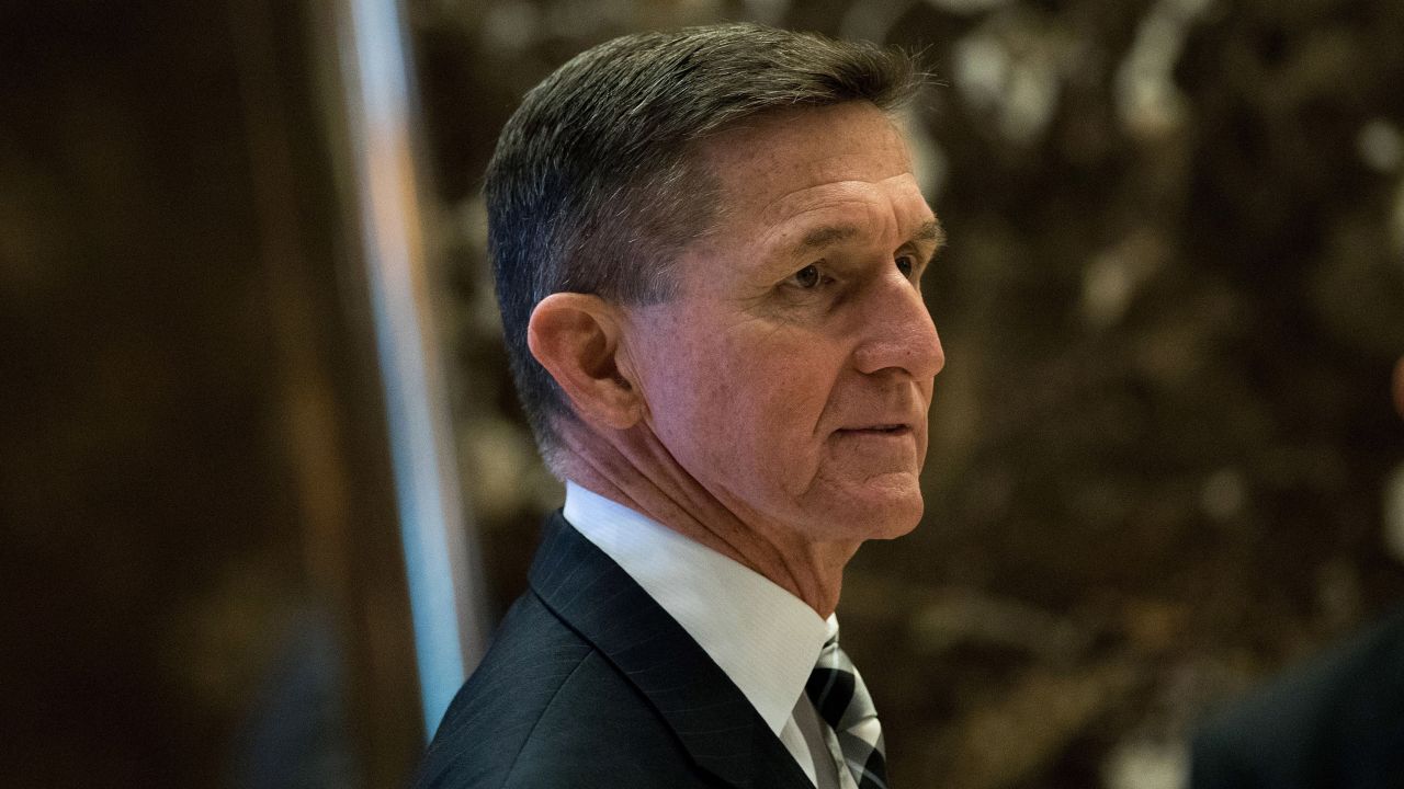 NEW YORK, NY - NOVEMBER 17: Retired Lt. Gen. Michael Flynn (C) arrives at Trump Tower, November 17, 2016 in New York City. President-elect Donald Trump and his transition team are in the process of filling cabinet and high level positions for the new administration. (Photo by Drew Angerer/Getty Images)