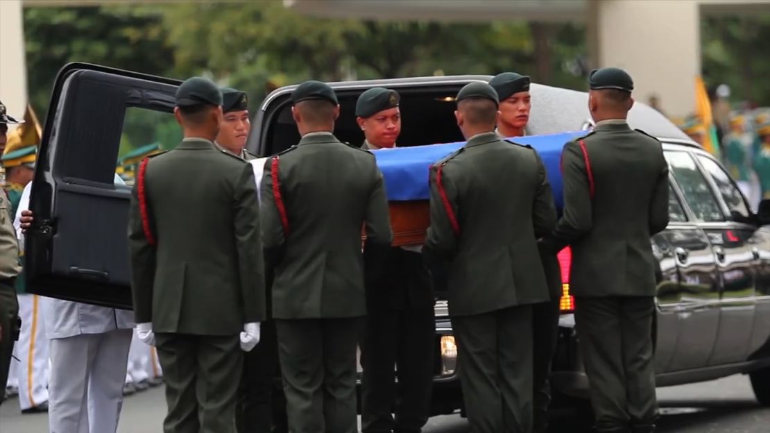 An image taken from a video posted by Imee Marcos shows Marcos' casket being carried to its resting place.