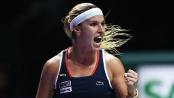 SINGAPORE - OCTOBER 23:  Dominika Cibulkova of Slovakia celebrates a point in her singles match against Angelique Kerber of Germany during day 1 of the BNP Paribas WTA Finals Singapore at Singapore Sports Hub on October 23, 2016 in Singapore.  (Photo by Julian Finney/Getty Images)