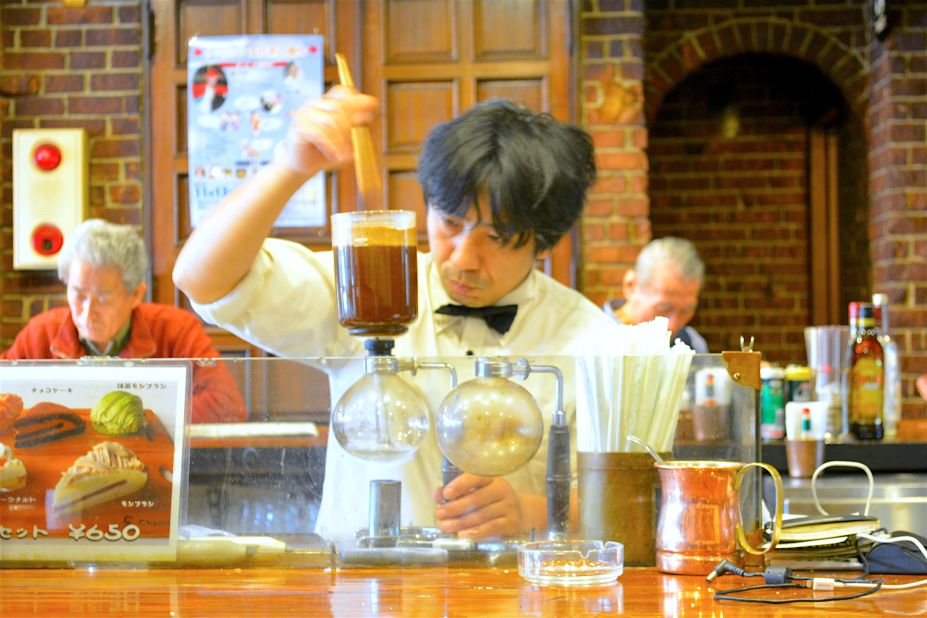 Presiding over the kissaten is a master, usually outfitted in a white shirt, sometimes with a bow tie. The techniques for brewing coffee used by the older masters, especially siphon and pour-over coffee, are embraced by the younger generation as well.   