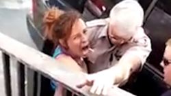 cop punches woman in face thumb 1