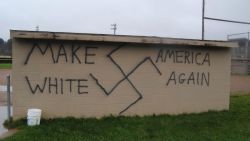 Someone painted "Make America White Again" on a dugout wall. 
