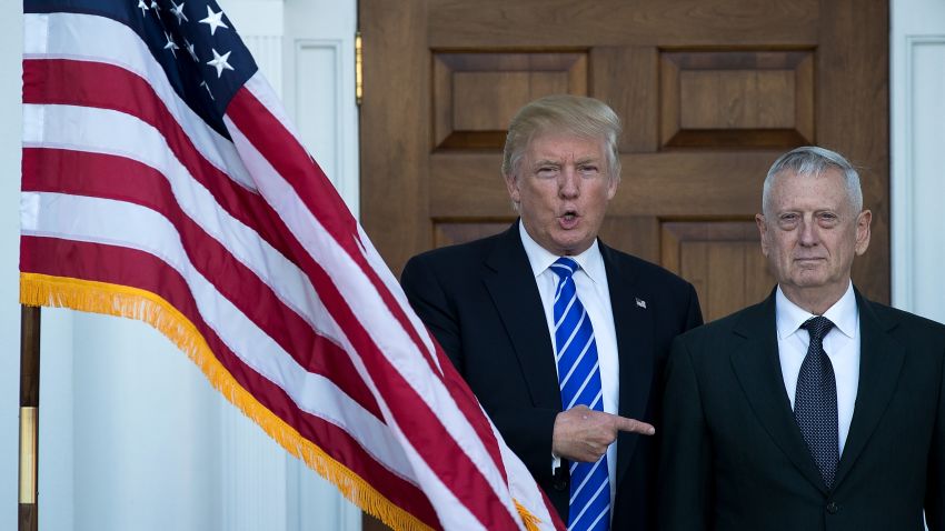 (L to R) President-elect Donald Trump welcomes retired United States Marine Corps general James Mattis as they pose for a photo before their meeting at Trump International Golf Club, November 19, 2016 in Bedminster Township, New Jersey.