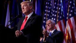Republican president-elect Donald Trump delivers his acceptance speech as Vice president-elect Mike Pence looks on during his election night event at the New York Hilton Midtown in the early morning hours of November 9, 2016 in New York City. Trump's vision of America seems to represent a rebuke of the multiracial "Beloved Community" that the Rev. Martin Luther King Jr. fought for, some say.