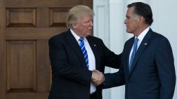 BEDMINSTER TOWNSHIP, NJ - NOVEMBER 19: (L to R) President-elect Donald Trump shakes hands with Mitt Romney after their meeting at Trump International Golf Club, November 19, 2016 in Bedminster Township, New Jersey. Trump and his transition team are in the process of filling cabinet and other high level positions for the new administration.  (Photo by Drew Angerer/Getty Images)
