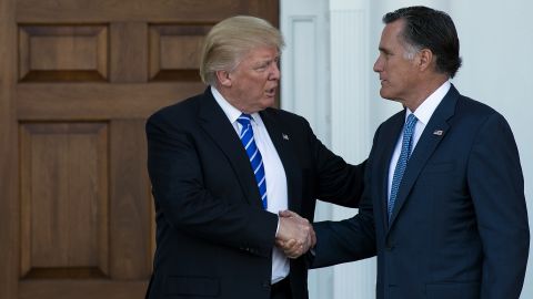 BEDMINSTER TOWNSHIP, NJ - NOVEMBER 19: (L to R) President-elect Donald Trump shakes hands with Mitt Romney after their meeting at Trump International Golf Club, November 19, 2016 in Bedminster Township, New Jersey. Trump and his transition team are in the process of filling cabinet and other high level positions for the new administration. (Photo by Drew Angerer/Getty Images)