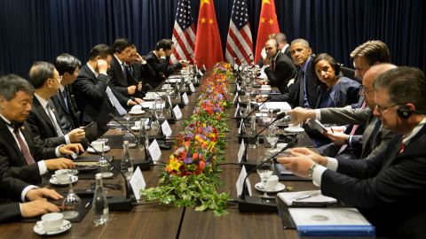 Obama and other leaders wait for a meeting November 19 during the summit of the Asia-Pacific Economic Cooperation.