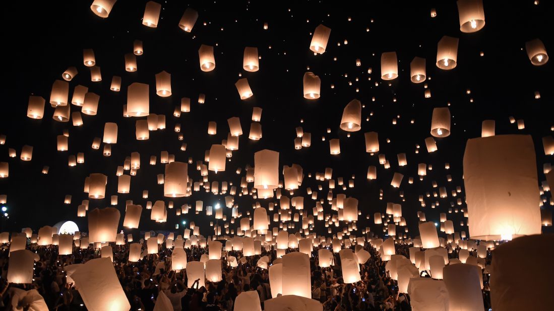 Thousands of paper lanterns rise above Chiang Mai, Thailand, to mark the annual Yi Peng festival. Authorities in Thailand have eased curbs on celebrations following a strict mourning period for late King Bhumibol Adulyadej.