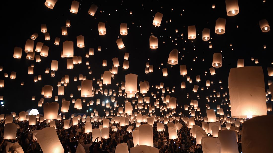 Thousands of paper lanterns rise above Chiang Mai, Thailand, to mark the annual Yi Peng festival. Authorities in Thailand have eased curbs on celebrations following a strict mourning period for late King Bhumibol Adulyadej.