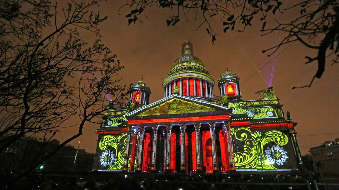 A projection is mapped onto the facade of St Isaac's Cathedral in St Petersburg. The Orthodox cathedral's 21.8 meter dome dominates the skyline of the Russian city.<br />