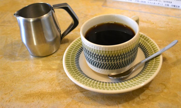 The house blend at Kyoto's Uzaru kissaten. Most kissaten masters use the siphon technique, a theatrical method of brewing coffee that dates back to the 1830s. Water and coffee grounds are mixed together and heated over a flame. The 'vacuum' effect produces a delicate coffee.