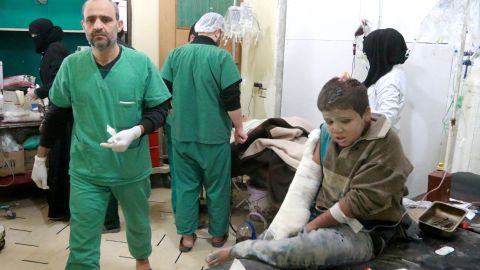 A wounded Syrian boy receives treatment at a hospital in eastern Aleppo.