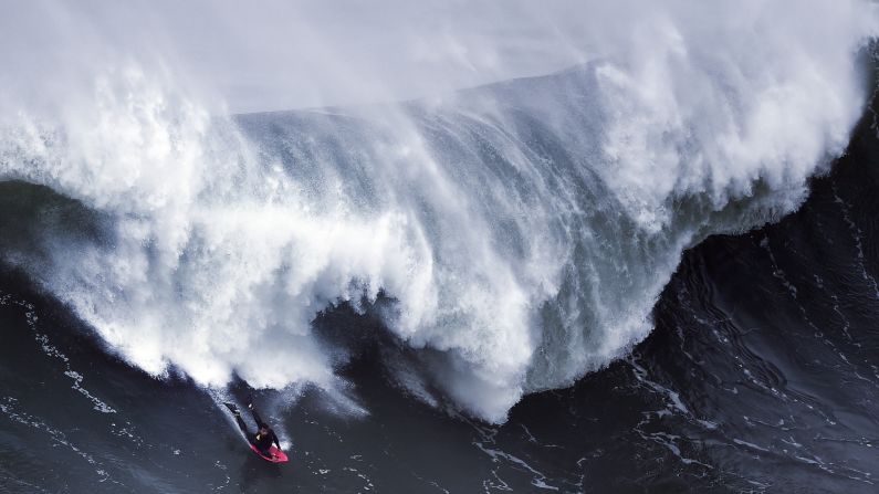 A bodyboarder takes part in a big-wave surfing session in Nazare, Portugal, on Saturday, November 19. 