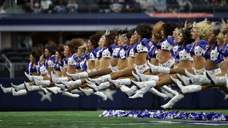 The Dallas Cowboys Cheerleaders perform at a home game against Baltimore on Sunday, November 20.