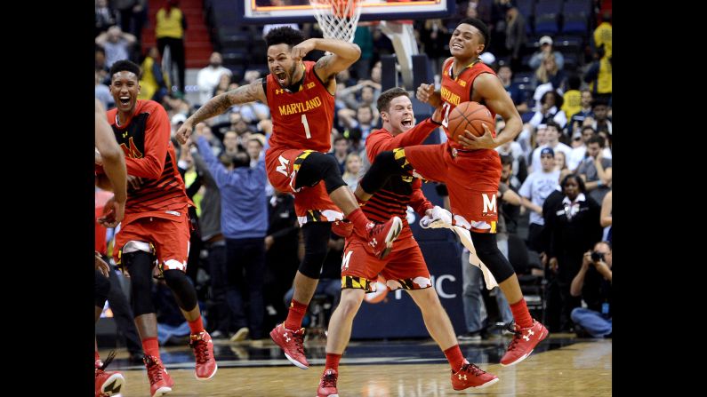 Maryland basketball players celebrate after their comeback victory against Georgetown on Tuesday, November 15.