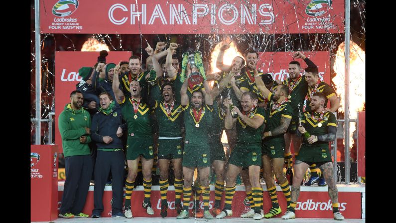 Australian rugby players celebrate after winning the Four Nations final against New Zealand on Sunday, November 20.