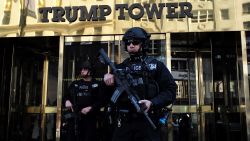 New York Police Department (NYPD) officers guard the main entrance of the Trump Tower, where US President-elect Donald Trump holds meetings, in New York on November 14, 2016. 