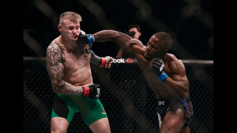 Abdul Razak Alhassan punches Charlie Ward during a UFC event in Belfast, Northern Ireland, on Saturday, November 19. Alhassan finished the fight in 53 seconds.