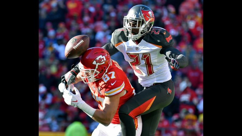 Tampa Bay cornerback Alterraun Verner, right, breaks up a pass intended for Kansas City tight end Travis Kelce during an NFL game in Kansas City, Missouri, on Sunday, November 20.