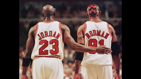 Rodman and teammate Michael Jordan were an unlikely duo in Chicago. Rodman, the tattooed, controversial free spirit, seemed nothing like Jordan, the clean-cut, corporate-friendly mega-star. But the Bulls won three straight titles and set a record for most regular-season wins in 1996.