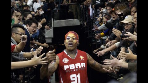 Rodman wears elaborate makeup before playing an exhibition game in Macau in 2011.