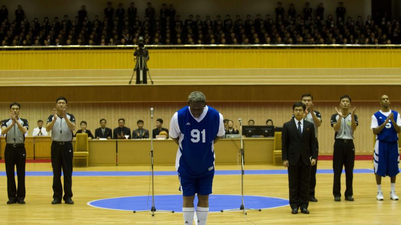 Rodman bows to North Korean leader Kim Jong Un before he and several other former NBA players played an exhibition game on Kim's birthday in 2014. Rodman even sang "Happy Birthday" to Kim before the game. Rodman received criticism back home for his friendliness toward the authoritarian leader. In an interview later, <a href="index.php?page=&url=http%3A%2F%2Fwww.cnn.com%2F2014%2F01%2F31%2Fus%2Fdennis-rodman-interview%2F" target="_blank">he told CNN</a> he's not a diplomat, just a former NBA star fighting alcoholism and trying to be a better father.