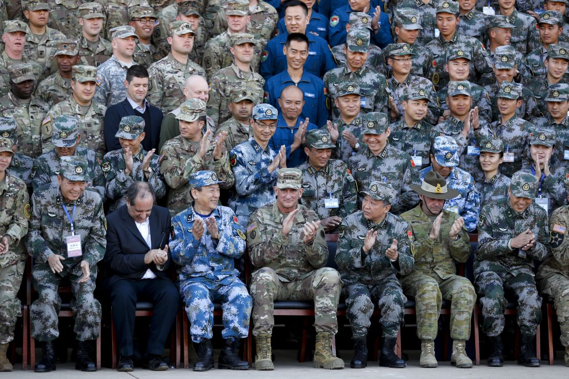 US and Chinese troops gather for a photo during their joint exercise.