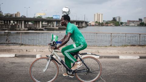 Harrison Chinedu cycling through the streets of Lagos on November 20, 2016 during his World Cup attempt. 