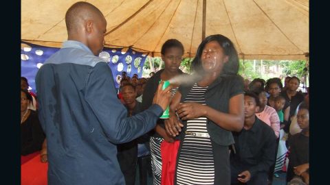 Pastor Lethebo Rabalago has posted photos on Facebook of him spraying insecticide into his congregants' faces.