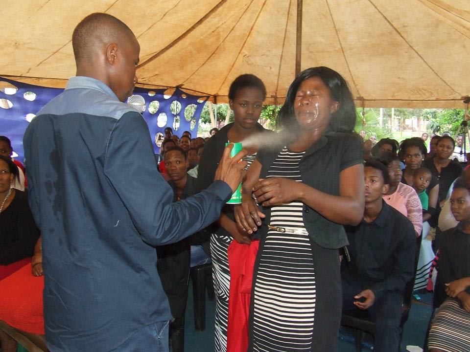 Pastor sprays insecticide on his congregants | CNN