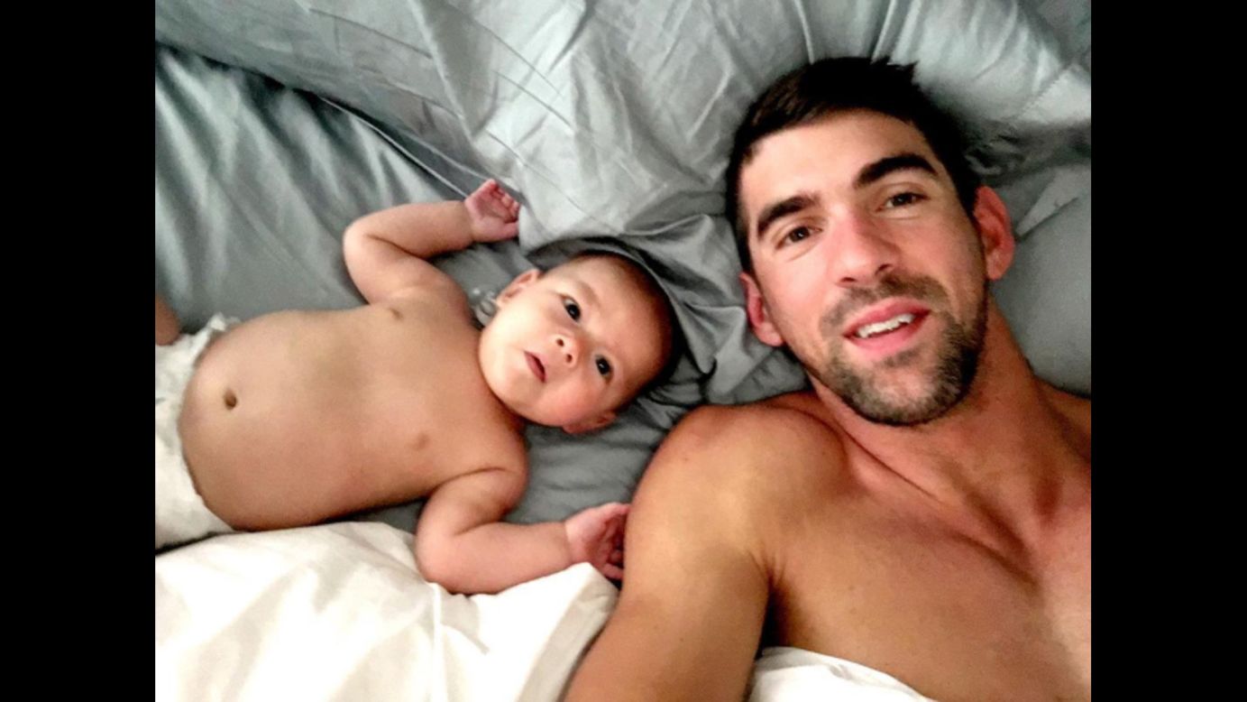 Michael Phelps, the most decorated Olympian of all time, takes a selfie with his son, Boomer, on Tuesday, September 13. "The little man and I don't wanna get out (of) bed this morning!!" <a href="https://www.instagram.com/p/BKTaFm8g_i9/" target="_blank" target="_blank">he said on Instagram.</a>
