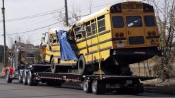 A school bus is carried away Tuesday, November 22, in Chattanooga, Tennessee from the site where it crashed on Monday. The bus driver, Johnthony Walker, has been arrested on charges including vehicular homicide, reckless driving and reckless endangerment. 