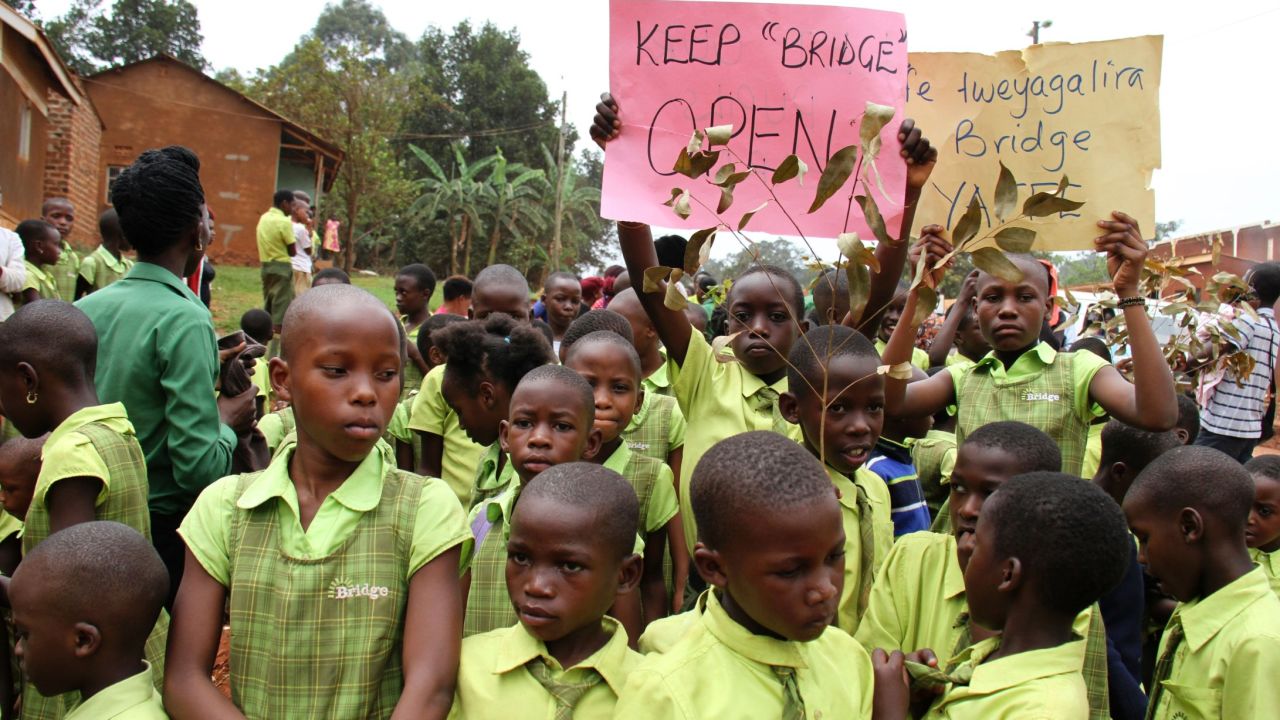 Pupils from Bridge International Academies protest after Uganda's High Court ordered the closure of its low-cost private schools.