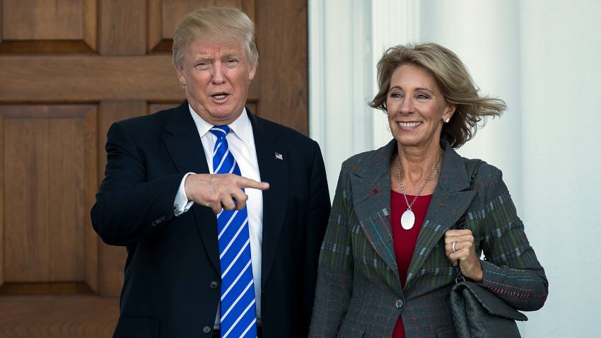 President-elect Donald Trump and Betsy DeVos after their meeting at Trump International Golf Club, November 19, in Bedminster Township, New Jersey. Trump has offered her the Education Secretary.