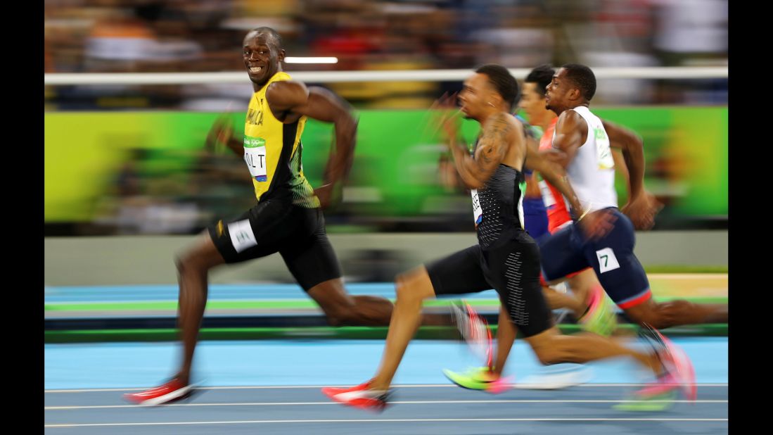 Jamaican sprinter Usain Bolt looks back at his Olympic competitors during a 100-meter semifinal on Sunday, August 14. Bolt <a href="http://www.cnn.com/2016/08/14/sport/usain-bolt-justin-gatlin-olympic-games-100-meters-rio/" target="_blank">won the final</a> a short time later, becoming the first man in history to win the 100 meters at three straight Olympic Games.