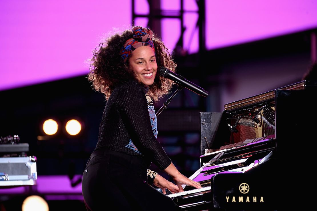  Alicia Keys performs in Times Square in New York City on October 9, 2016 