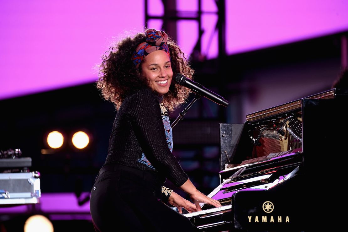 Alicia Keys performs in Times Square in New York City on October 9, 2016